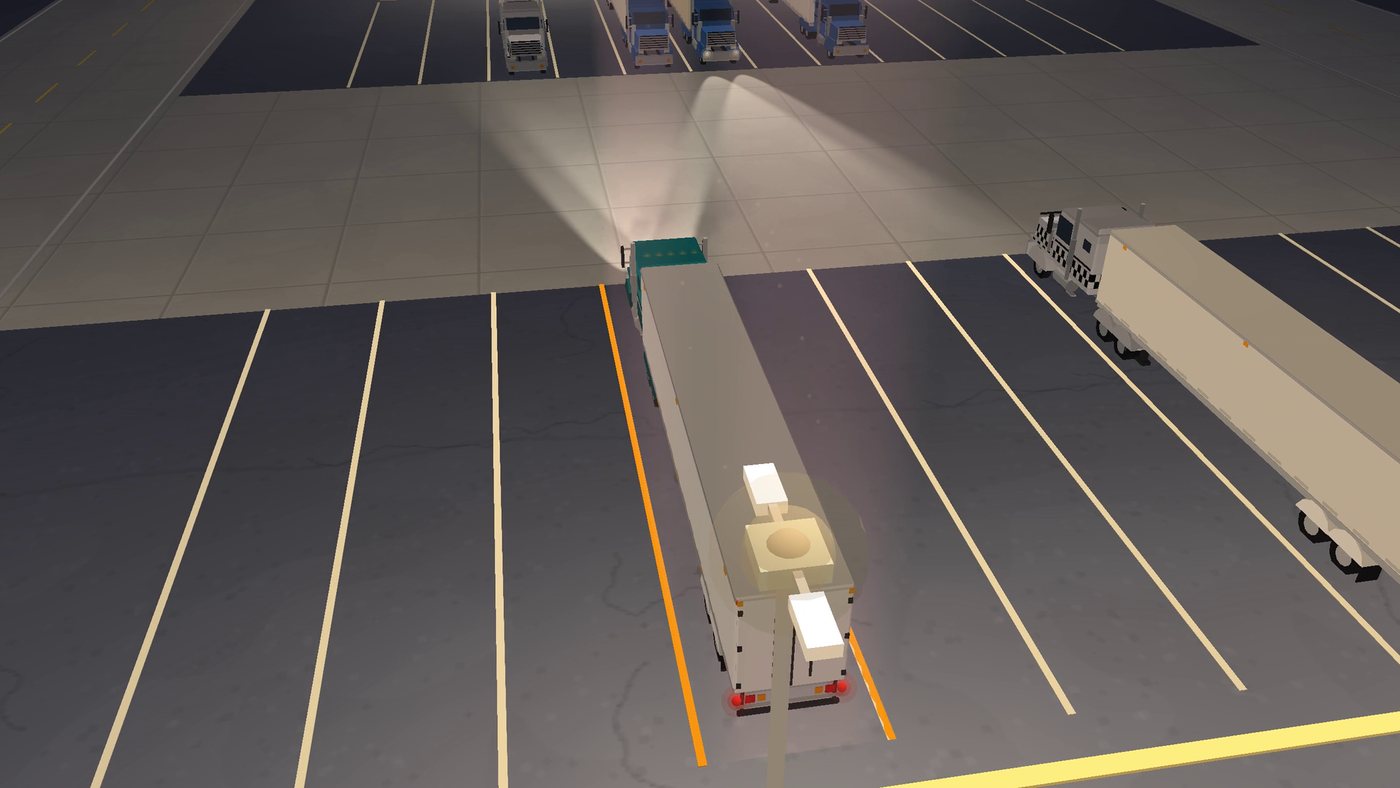 A rig lined up on a stall in fog under the lot lights